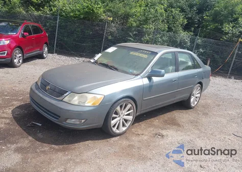 2001 Toyota Avalon Xls z USA, uszkodzony, nr VIN 4T1BF28B51U158235
